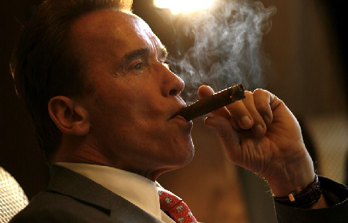 Arnold Smoking A Cigar